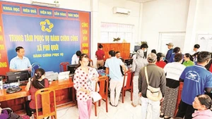 Trung tâm phục vụ hành chính công xã Phú Quới, tỉnh Vĩnh Long. (Ảnh BÁ DŨNG)
