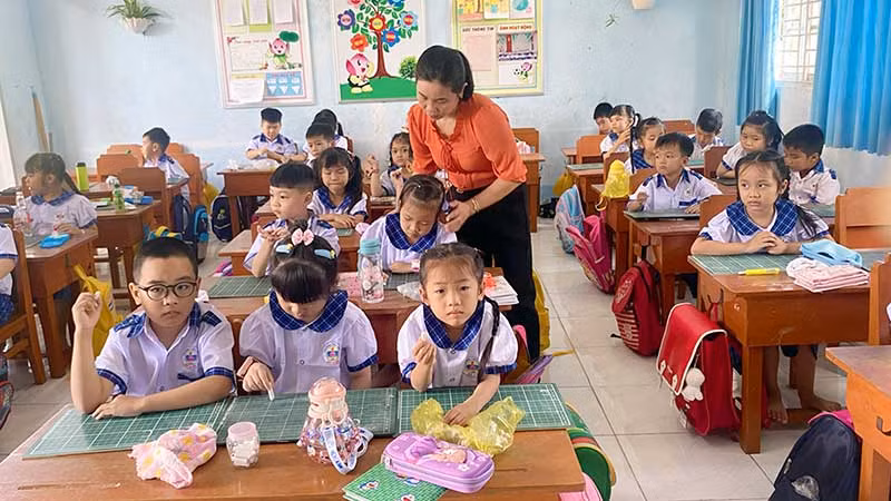 Học sinh Trường tiểu học Mỹ Hiệp, huyện Cao Lãnh, tỉnh Đồng Tháp trong ngày tựu trường.