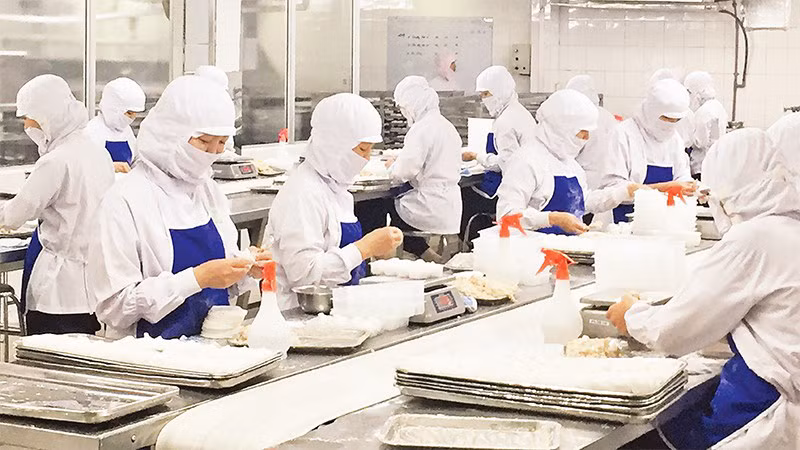 Lao động tại Công ty cổ phần Thực phẩm Agrex Saigon. (Ảnh: Phương Vy)