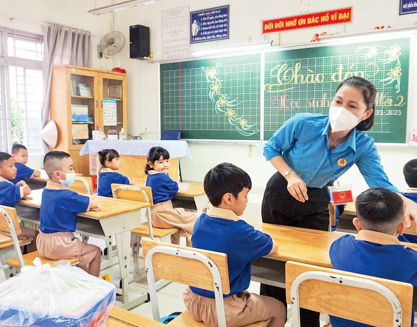 Giờ sinh hoạt đầu năm của học sinh lớp 1 Trường tiểu học Phạm Văn Chính, thành phố Thủ Đức. (Ảnh THU HOÀI)