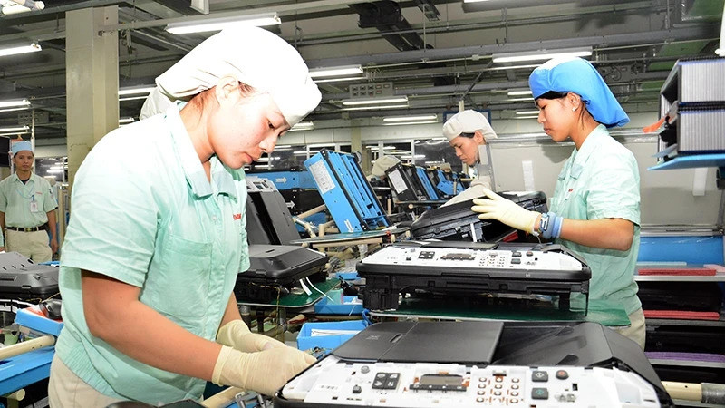 Lao động tại Công ty TNHH Canon Việt Nam, Khu công nghiệp Thăng Long, Hà Nội. (Ảnh: ĐĂNG ANH)
