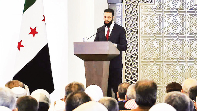 Tổng thống lâm thời Syria phát biểu tại hội nghị đối thoại quốc gia. 