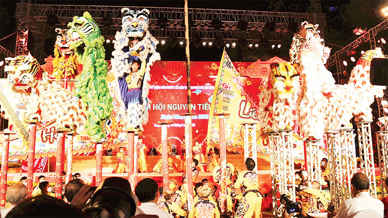 Biểu diễn Lân-Sư-Rồng tại Quận 5, cái nôi của loại hình nghệ thuật này tại Thành phố Hồ Chí Minh. (Ảnh HOÀNG VIỆT TRUNG) 