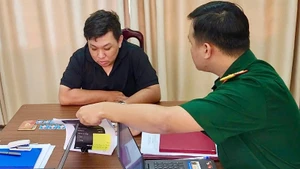 Đối tượng Đặng Ngọc Minh tại cơ quan điều tra.