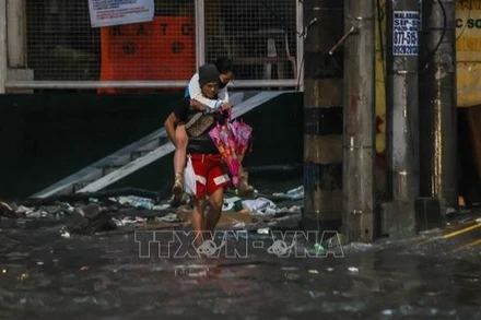 Cảnh ngập lụt do mưa bão tại Quezon, Philippines. (Ảnh: THX)