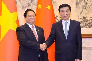 Thủ tướng Phạm Minh Chính hội kiến Chủ tịch Chính hiệp toàn quốc Trung Quốc - Ảnh: VGP/Nhật Bắc