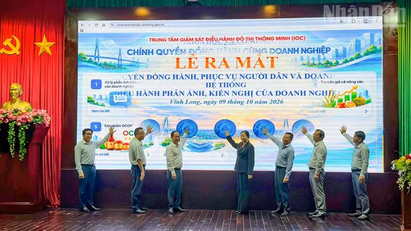 Nghi thức lễ ra mắt mô hình: "Doanh nghiệp nói-chính quyền hành động". (Ảnh: BÁ DŨNG)