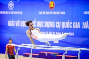 Đinh Phương Thành giữ phong độ cao tại Giải vô địch Thể dục dụng cụ quốc gia 2025. (Ảnh MINH DÂN) 