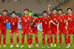 Đội tuyển U23 Việt Nam ăn mừng chiến thắng trong lượt trận vòng bảng tại Giải U23 châu Á. (Ảnh: Diệp Sơn Nam)