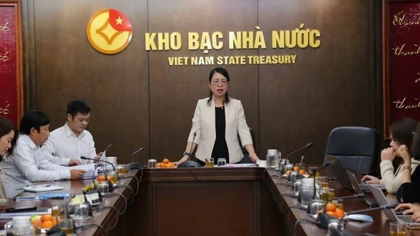 Ảnh minh họa: Bà Ngô Thị Nhung, Phó Giám đốc Kho bạc Nhà nước chia sẻ thông tin về hoạt động Kho bạc Nhà nước. (Ảnh: VGP)