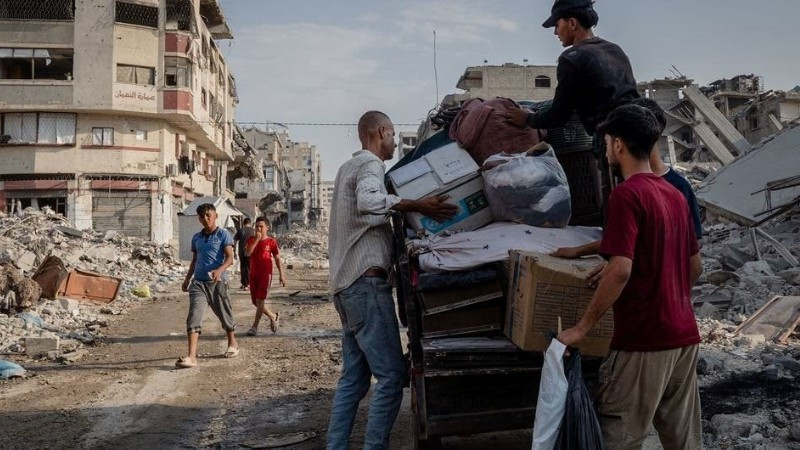 Người dân ở Gaza trở về nhà sau khi lệnh ngừng bắn có hiệu lực. (Ảnh WEF)