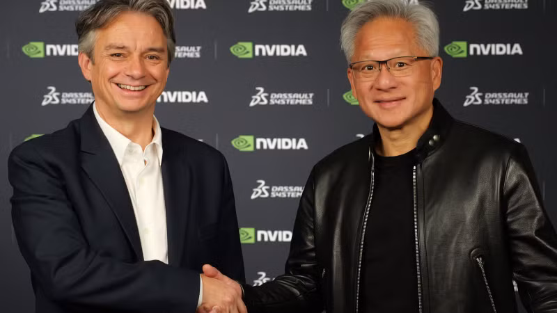 Pascal Daloz, Tổng Giám đốc điều hành Dassault Systèmes (trái) và ông Jensen Huang (phải), Nhà sáng lập kiêm Tổng Giám đốc điều hành NVIDIA ký hợp tác xây dựng kiến trúc AI công nghiệp.