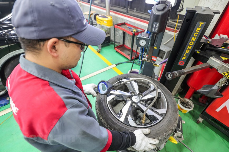 [Ảnh] Dân Hà Nội chi tiền triệu "làm đẹp" ô-tô đón tết Nguyên đán ảnh 12