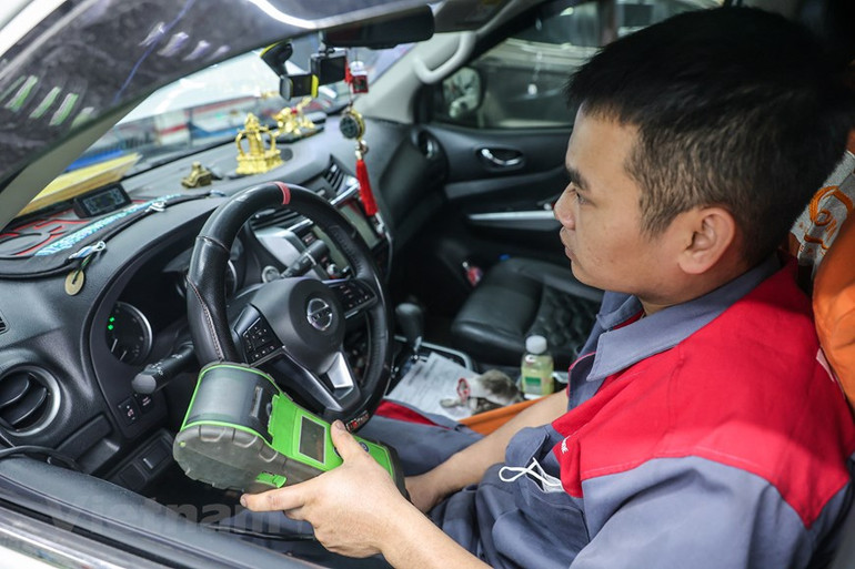 [Ảnh] Dân Hà Nội chi tiền triệu "làm đẹp" ô-tô đón tết Nguyên đán ảnh 17