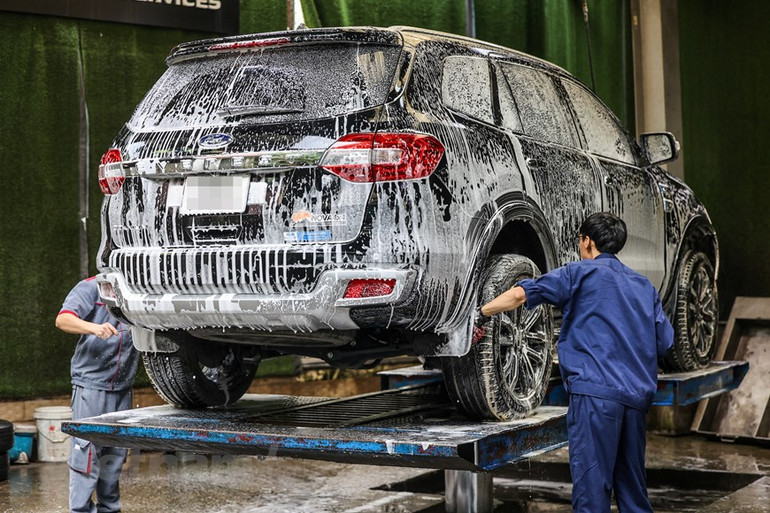 [Ảnh] Dân Hà Nội chi tiền triệu "làm đẹp" ô-tô đón tết Nguyên đán ảnh 15