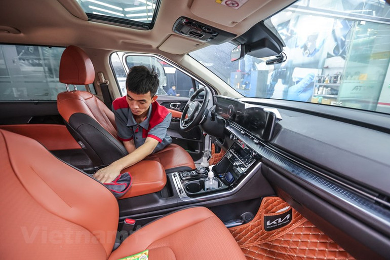 [Ảnh] Dân Hà Nội chi tiền triệu "làm đẹp" ô-tô đón tết Nguyên đán ảnh 9