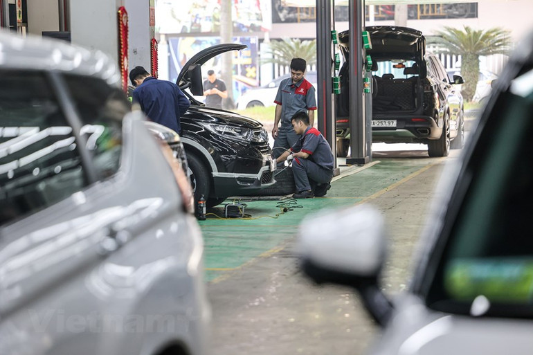 [Ảnh] Dân Hà Nội chi tiền triệu "làm đẹp" ô-tô đón tết Nguyên đán ảnh 8