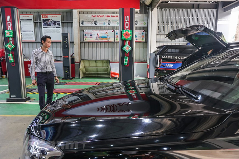 [Ảnh] Dân Hà Nội chi tiền triệu "làm đẹp" ô-tô đón tết Nguyên đán ảnh 4