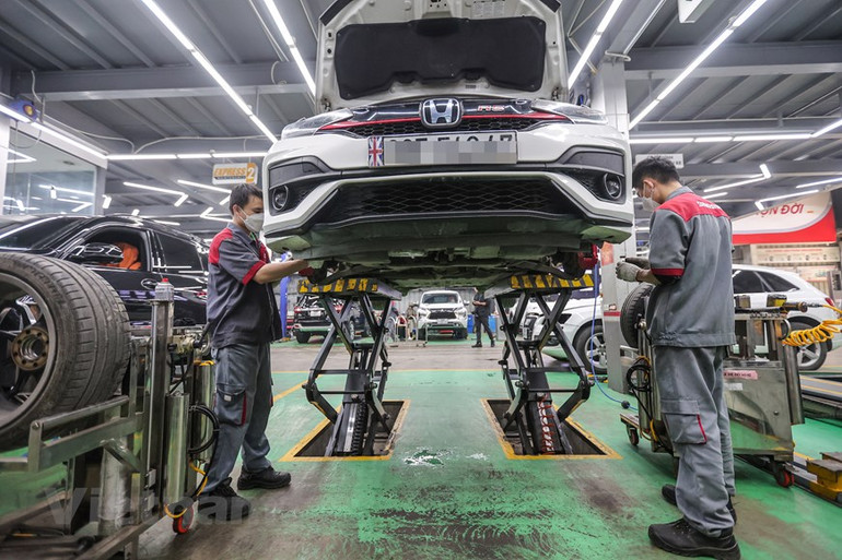 [Ảnh] Dân Hà Nội chi tiền triệu "làm đẹp" ô-tô đón tết Nguyên đán ảnh 6