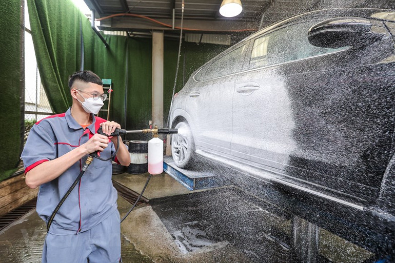 [Ảnh] Dân Hà Nội chi tiền triệu "làm đẹp" ô-tô đón tết Nguyên đán ảnh 13