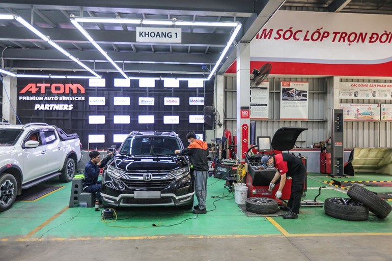 [Ảnh] Dân Hà Nội chi tiền triệu "làm đẹp" ô-tô đón tết Nguyên đán ảnh 5