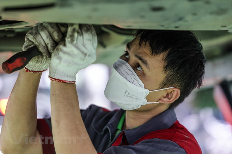 [Ảnh] Dân Hà Nội chi tiền triệu "làm đẹp" ô-tô đón tết Nguyên đán ảnh 7