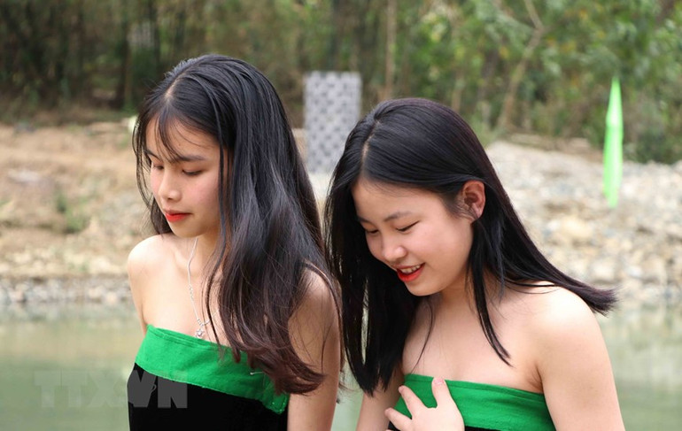 Vẻ đẹp trong trẻo của các cô gái Thái trắng ở khu vực Mường So, huyện Phong Thổ, tỉnh Lai Châu. (Ảnh: Văn Oanh/TTXVN)
