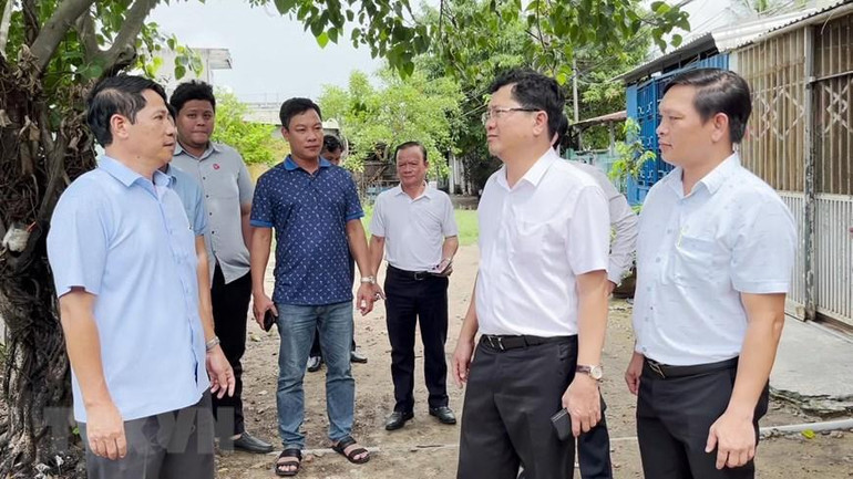 [Ảnh] Người dân tại miền trung hối hả phòng, chống bão Noru ảnh 20