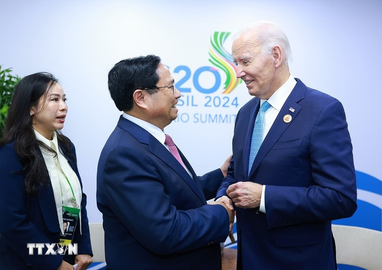 Thủ tướng Phạm Minh Chính gặp Tổng thống Hoa Kỳ Joe Biden. Thủ tướng Phạm Minh Chính gặp Tổng thống Hoa Kỳ Joe Biden.