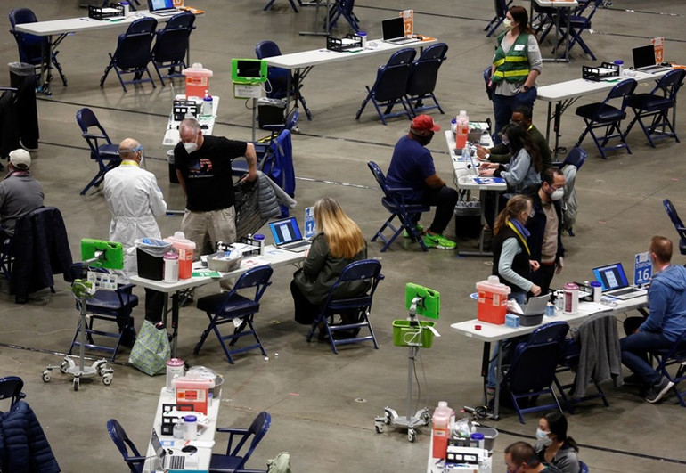 Mỹ siết chặt yêu cầu tiêm vaccine ngừa Covid-19 -0