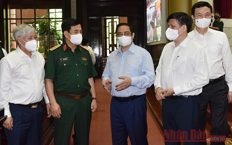 Quyết tâm trên dưới một lòng, thực hiện thành công Chiến dịch tiêm chủng vaccine phòng Covid-19 toàn quốc -0