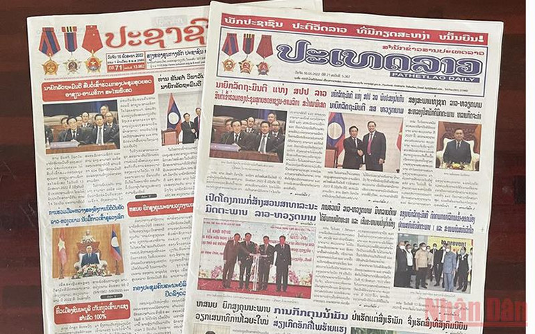 Báo chí Lào đưa tin về hoạt động của Chủ tịch Quốc hội Vương Đình Huệ tại Lào -0