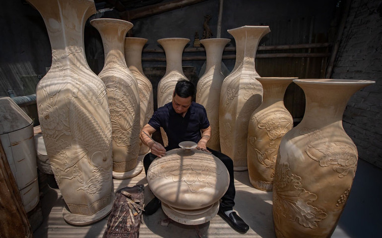 Người sở hữu những kỷ lục thế giới về gốm -0