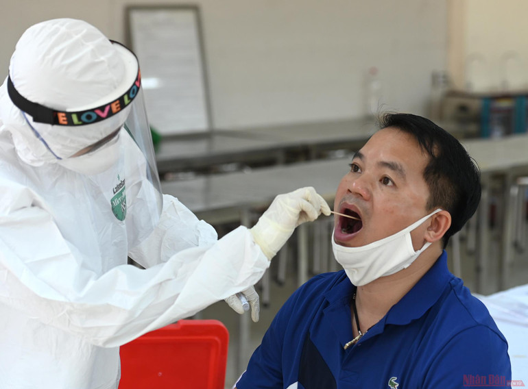 Hà Nội xét nghiệm PCR cho người dân trở về từ Đà Nẵng -6