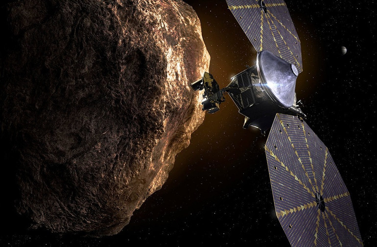 Ấn tượng của một nghệ sĩ về tàu vũ trụ Lucy bay gần một tiểu hành tinh. Ảnh: NASA / JPL-Caltech. Những cột mốc chinh phục vũ trụ trong năm 2021 -0