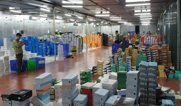 Tiếp tục làm rõ kho hàng lậu khủng ở Lào Cai -0