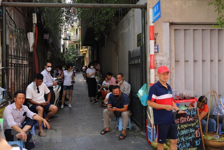 [Photo] Hà Nội trải qua đợt cao điểm nắng nóng, có lúc tới 40 độ C -0