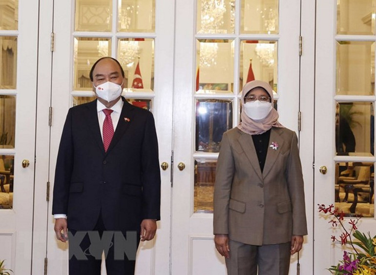 Lễ đón Chủ tịch nước Nguyễn Xuân Phúc thăm cấp Nhà nước tới Singapore -0