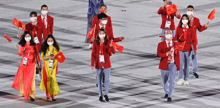 Hình ảnh Đoàn thể thao Việt Nam diễu hành ở lễ khai mạc Olympic Tokyo -0
