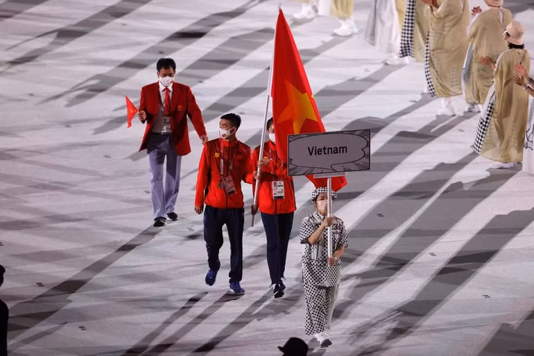 Hình ảnh Đoàn thể thao Việt Nam diễu hành ở lễ khai mạc Olympic Tokyo -0