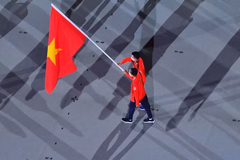 Hình ảnh Đoàn thể thao Việt Nam diễu hành ở lễ khai mạc Olympic Tokyo -0