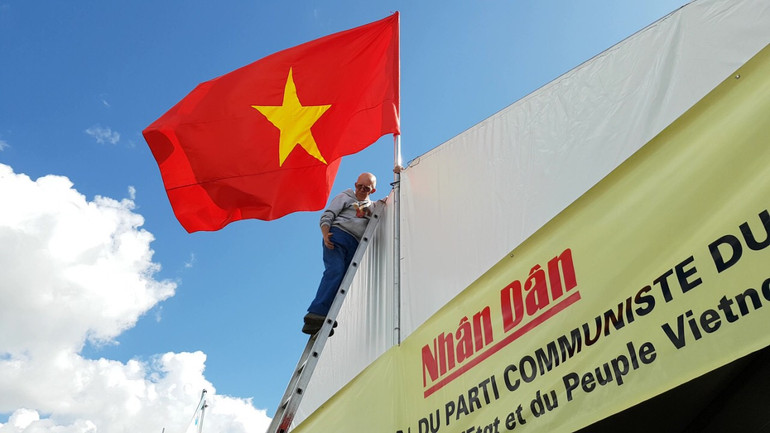 Mừng Báo Nhân Dân 70 năm đồng hành cùng dân tộc -0