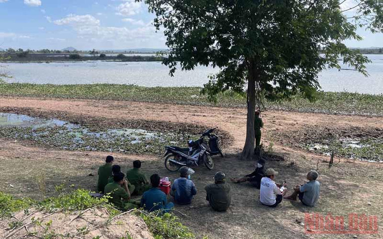 Phát hiện thi thể 3 người đàn ông dưới hồ thủy lợi Suối Đá, Bình Thuận -0