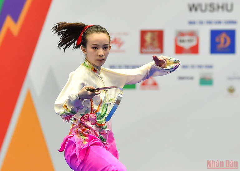 Sau chấn thương của người đồng đội Nguyễn Văn Phương, áp lực huy chương được đặt lên hai vận động viên nữ của tổ Thái cực là Trần Thị Minh Huyền và Trần Thị Kiều Trang. Những làn gió mới của Wushu Việt Nam -0