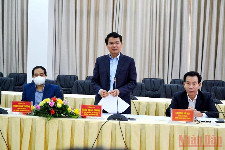 Tăng cường hợp tác truyền thông giữa tỉnh Lào Cai và Báo Nhân Dân -0