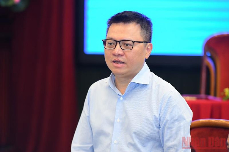 Tăng cường hợp tác thông tin tuyên truyền giữa Báo Nhân Dân và Bộ Xây dựng -0