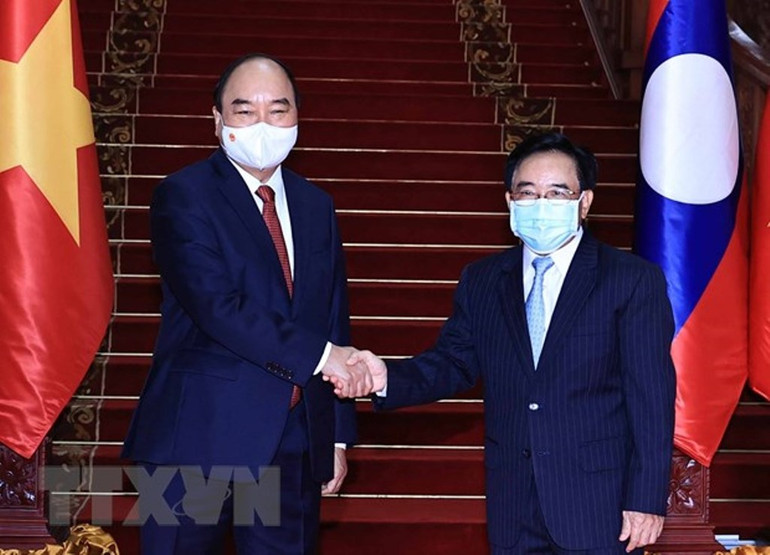 Chủ tịch nước Nguyễn Xuân Phúc hội kiến Thủ tướng Lào Viphavanh -0