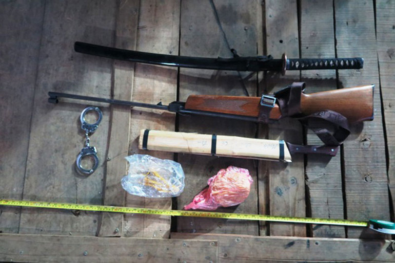 Triệt phá hai băng nhóm bảo kê đường biên ở Lào Cai -0