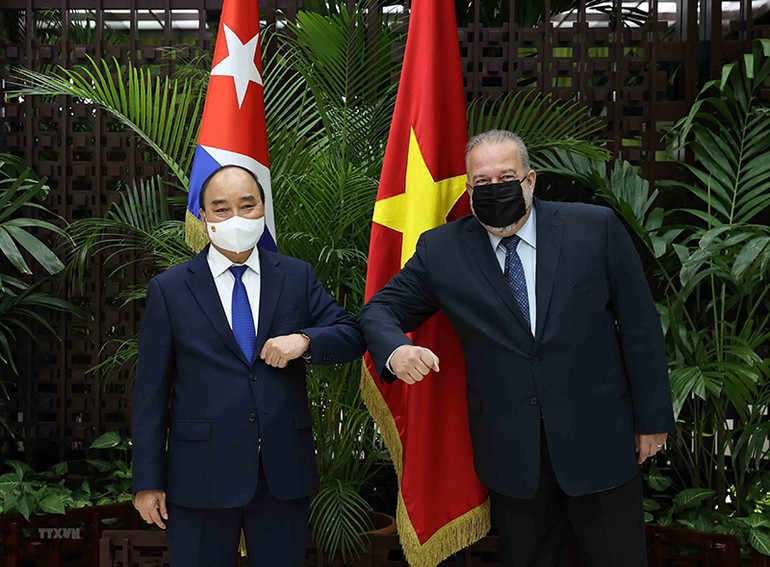 Chủ tịch nước Nguyễn Xuân Phúc hội kiến Thủ tướng Cộng hòa Cuba Manuel Marrero Cruz. (Ảnh: Thống Nhất/TTXVN) Truyền thông Cuba đưa tin đậm nét về chuyến thăm của Chủ tịch nước -0