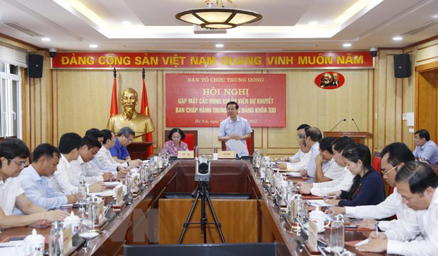 Quang cảnh hội nghị. (Ảnh: TTXVN) Gặp mặt các đồng chí Ủy viên dự khuyết Ban Chấp hành Trung ương Đảng khóa XIII -0